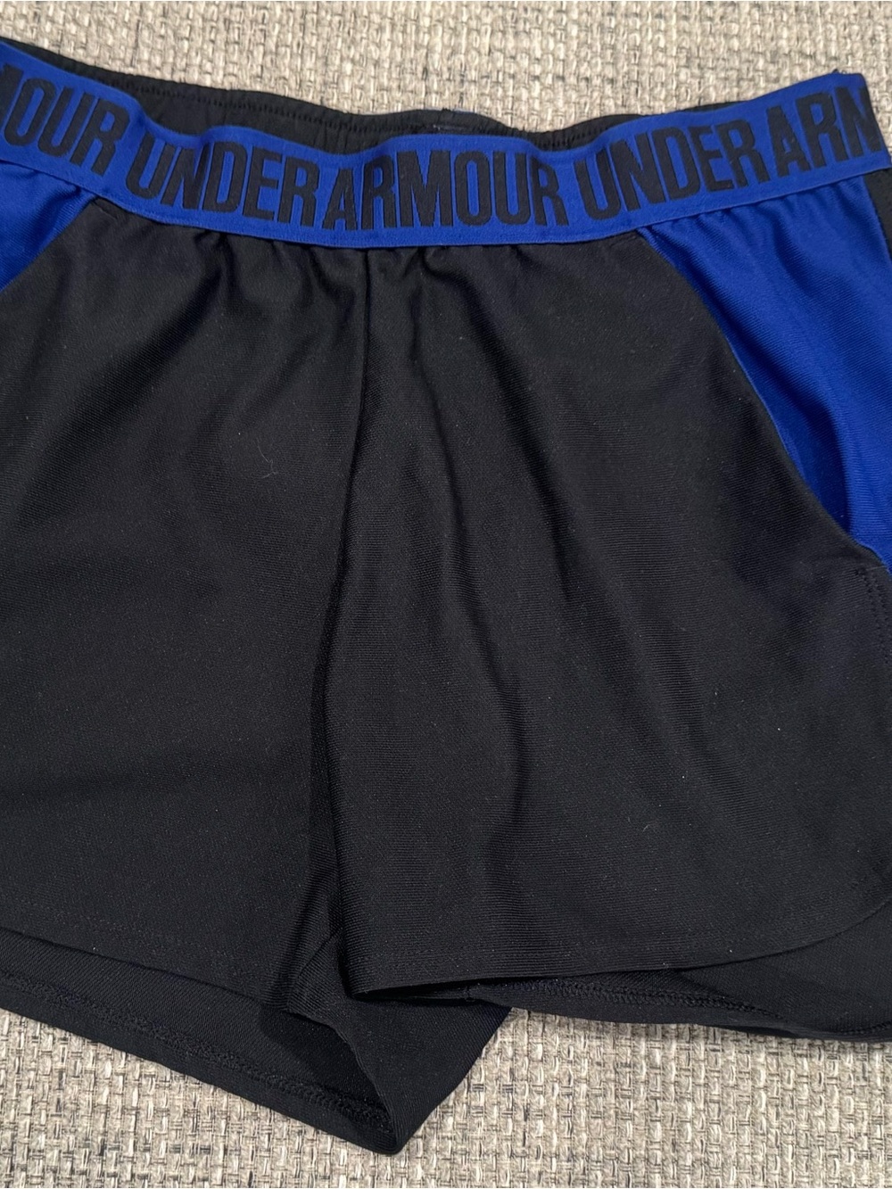Under Armour women’s Black & Blue Performance shorts